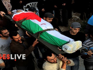 Palestinian Territory - Mourners carry the body of Palestinian Ahmad Aamer, 16, who the Israeli military said was shot dead by Israeli soldiers after he tried to stab them, during his funeral in the West Bank village of Mas'ha near Salfit March 9, 2016./Mohammed Turabi