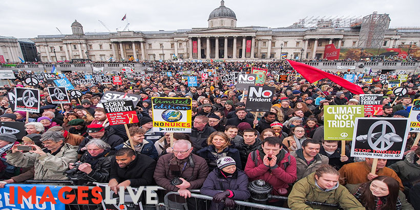 The 'Stop Trident' demonstration finishes at Trafalgar Square, where tens of thousands of people gather to listen to speeches.