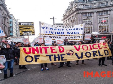 A large crowd of activists representing cleaners and e-couriers who are demanding to be paid the London Living Wage protested outside clothing retailer Topshop's flagship store on Oxford Street before marching the short distance to the John Lewis department store which they entered en masse and held a short but noisy protest, much to the bemusement of shoppers. The campaigners claim that the Minimum Wage is simply not enough to live on, and all the cleaning staff at both stores have to claim benefits from the state just in order to survive.