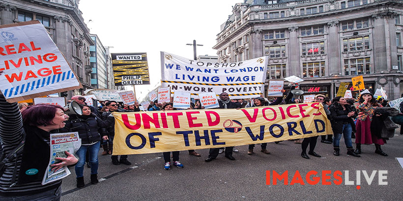 A large crowd of activists representing cleaners and e-couriers who are demanding to be paid the London Living Wage protested outside clothing retailer Topshop's flagship store on Oxford Street before marching the short distance to the John Lewis department store which they entered en masse and held a short but noisy protest, much to the bemusement of shoppers. The campaigners claim that the Minimum Wage is simply not enough to live on, and all the cleaning staff at both stores have to claim benefits from the state just in order to survive.