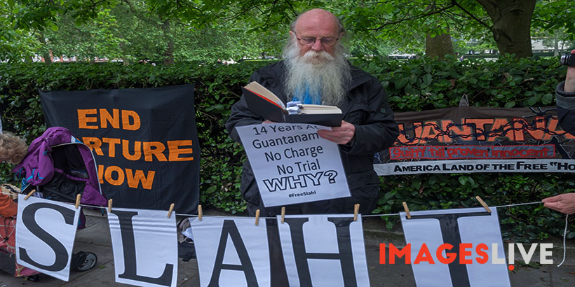 June 2nd 2016, London, UK. Today's monthly 'Shut Guantanamo' protest at the US Embassy in London featured readings from the heavily redacted best-selling 'Guantanamo Diary' by Mauritanian prisoner Mohamedou Ould Slahi, arrested following an identity mistake in 2002 and subjected to savage beatings, death threats and sexual humiliation in Guantanamo detailed in his 2005 book. Still held in Guantanamo, his case comes up for review today. He has not yet been allowed to read his own book. Peter Marshall / ImagesLive
