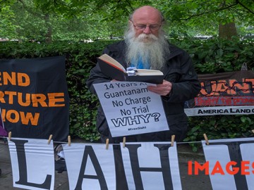June 2nd 2016, London, UK. Today's monthly 'Shut Guantanamo' protest at the US Embassy in London featured readings from the heavily redacted best-selling 'Guantanamo Diary' by Mauritanian prisoner Mohamedou Ould Slahi, arrested following an identity mistake in 2002 and subjected to savage beatings, death threats and sexual humiliation in Guantanamo detailed in his 2005 book. Still held in Guantanamo, his case comes up for review today. He has not yet been allowed to read his own book. Peter Marshall / ImagesLive
